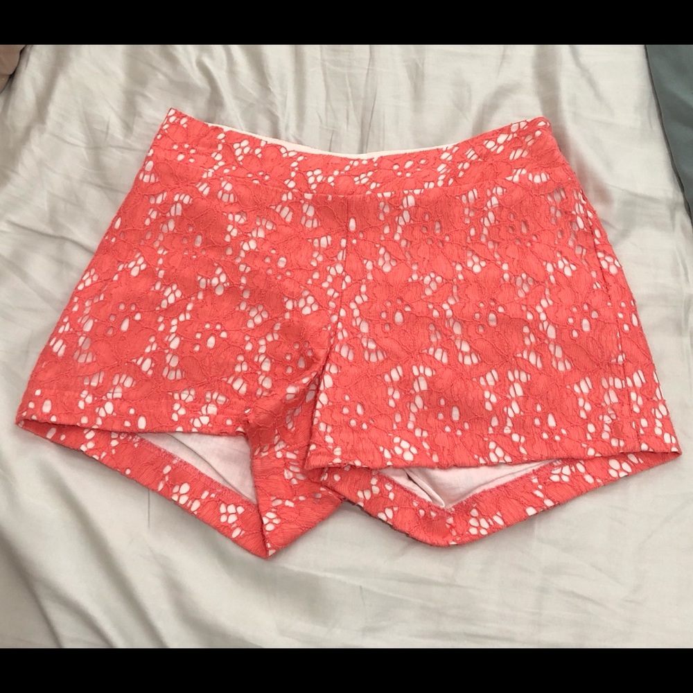 linen shorts with a peach-pink lace overlay